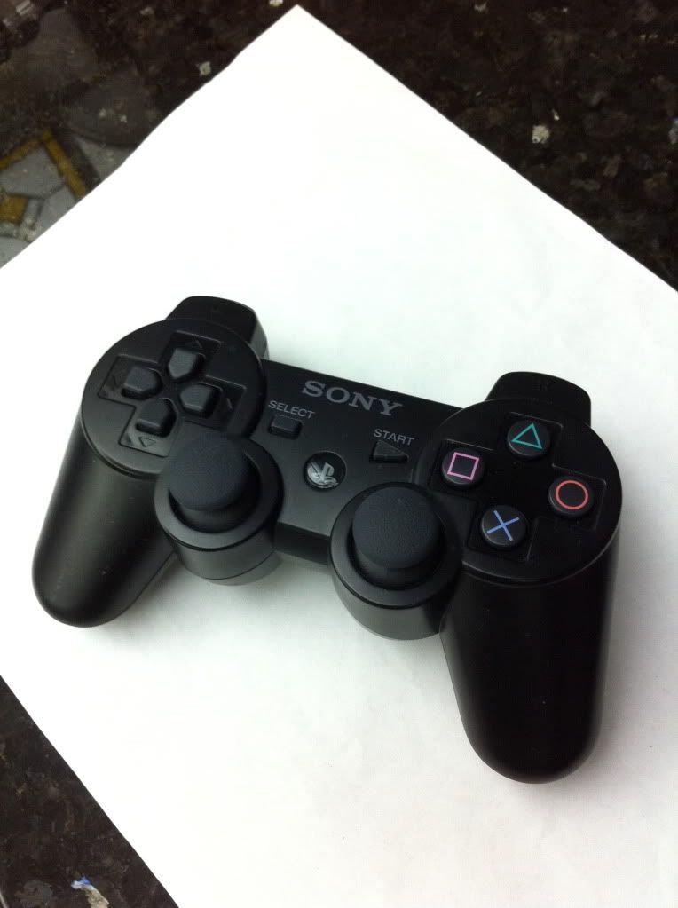 ***SOLD*** two used PS3 controllers (one authentic, one aftermarket