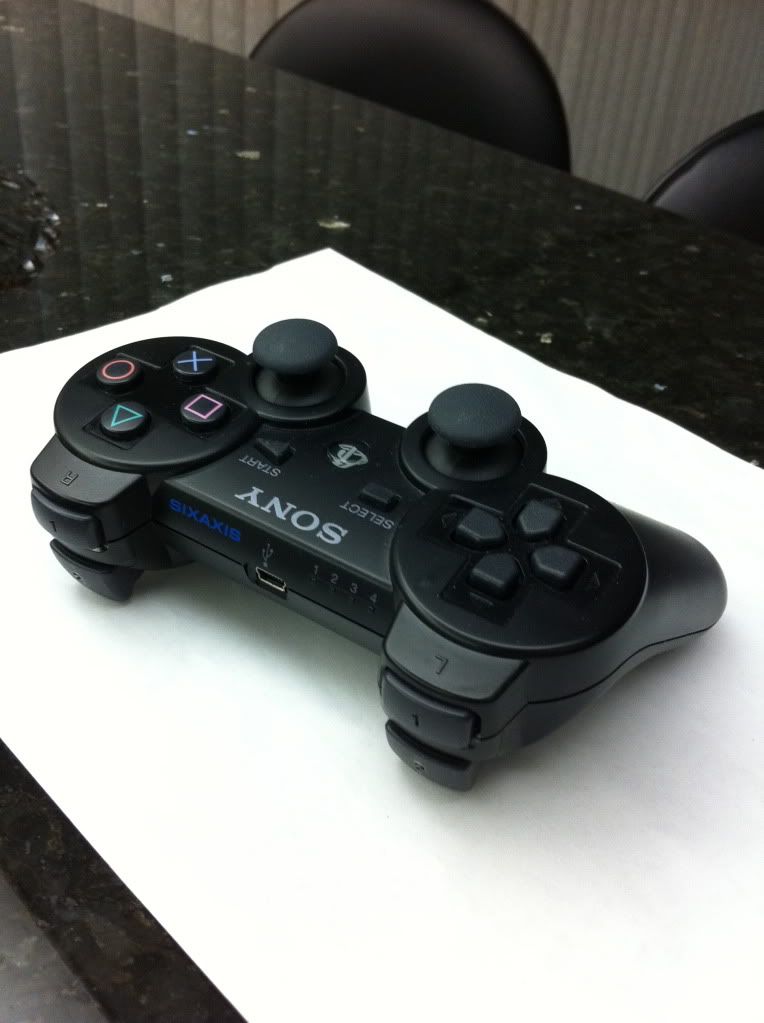 ***SOLD*** two used PS3 controllers (one authentic, one aftermarket