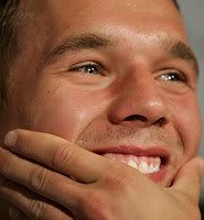 Podolski out with injury